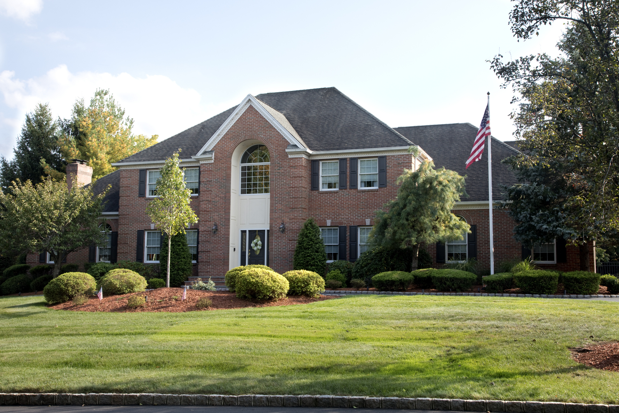 surrounding subdivisions of saline roofing, Exterior of elegant affluent home in the suburbs.